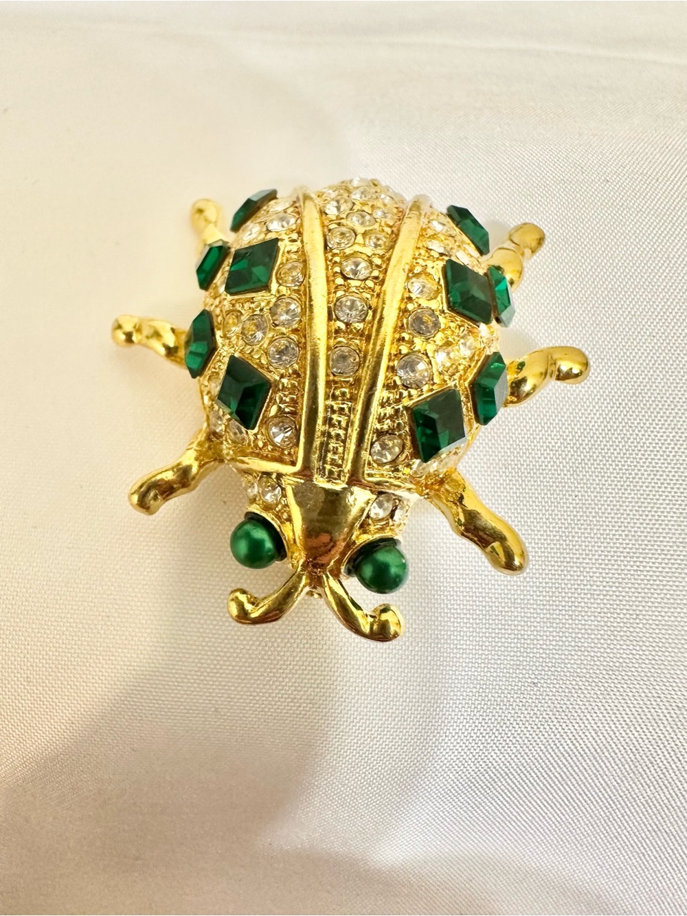 Vintage Gold-Plated Beetle Brooch with Emerald Green Stones